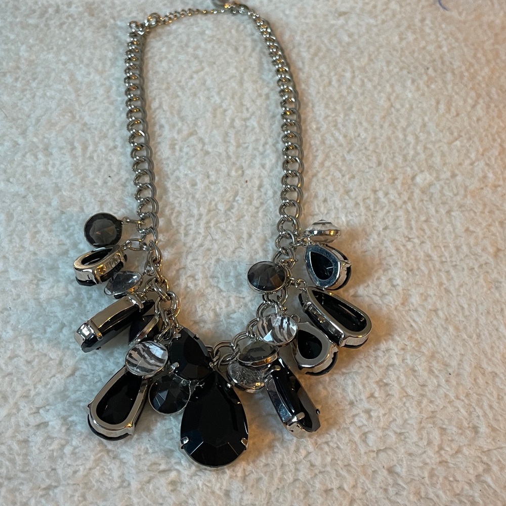 silver tone chain with black and white stripes beads
